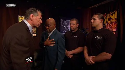 Mr. McMahon and General Manager Teddy Long talk
