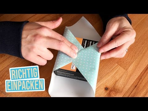 Video: So Verpacken Sie Ein Geschenk In Papier