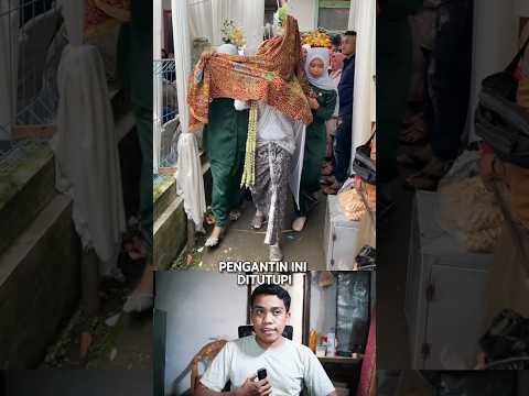 Wajah pengantin di tutup kain