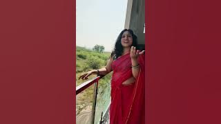 Classic Indian Look: Red Saree Paired with Green Blouse