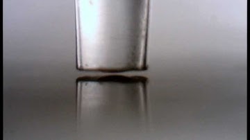 Contact printing of a nanoliter droplet