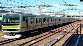 E231系1000番台K-12編成+JR東日本E233系3000番台E-73編成が湘南新宿ライン東海道線直通快速平塚行きとして大宮駅6番線に入線到着停車するシーン(2835Y)2024/01/01