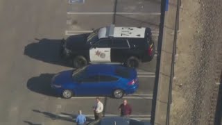 Orange County deputy stabbed in neck, suspect on the run