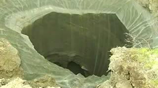 New video! Giant hole on Yamal GIANT SINKHOLE Appears is Yamal, RUSSIA   Ямал   невероятная воронка(Massive crater suddenly appears in Siberia Yamal в 30км от Бованенково 1. Зеленая растительность это лес 2. Тот грунт что лежит вокру..., 2014-07-24T06:19:58.000Z)