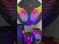 Painel de festa redondo em tecido sublimado no tema Asas Neon.