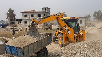 JCB Backhoe Loader Loading Sand and Stone in Tractor - Sonalika DI 745 Tractor - JCB Video