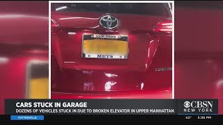 Exclusive: More Than 2 Dozen Cars Trapped In Parking Garage