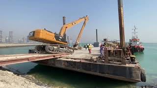 Barge # excavator long boom CAT loading