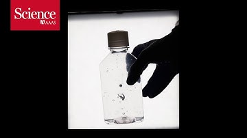 Air bubbles sink and steel spheres rise in an unusual fluid