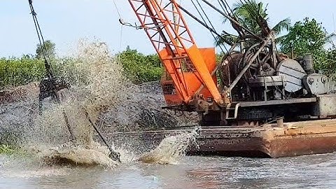 XÁNG CẠP MÚC ĐẤT VÉT KINH cần cẩu xáng cạp xáng múc xe múc