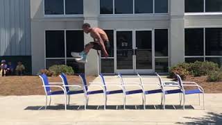 Guy Flies Over Eight Chairs - 990716