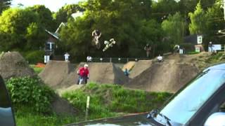 Pro riders hit jumps in super slick HD slo-mo