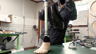 Process of Making a Carbon Prosthetic Leg for Amputee by a Korean Prosthesis Artisan.