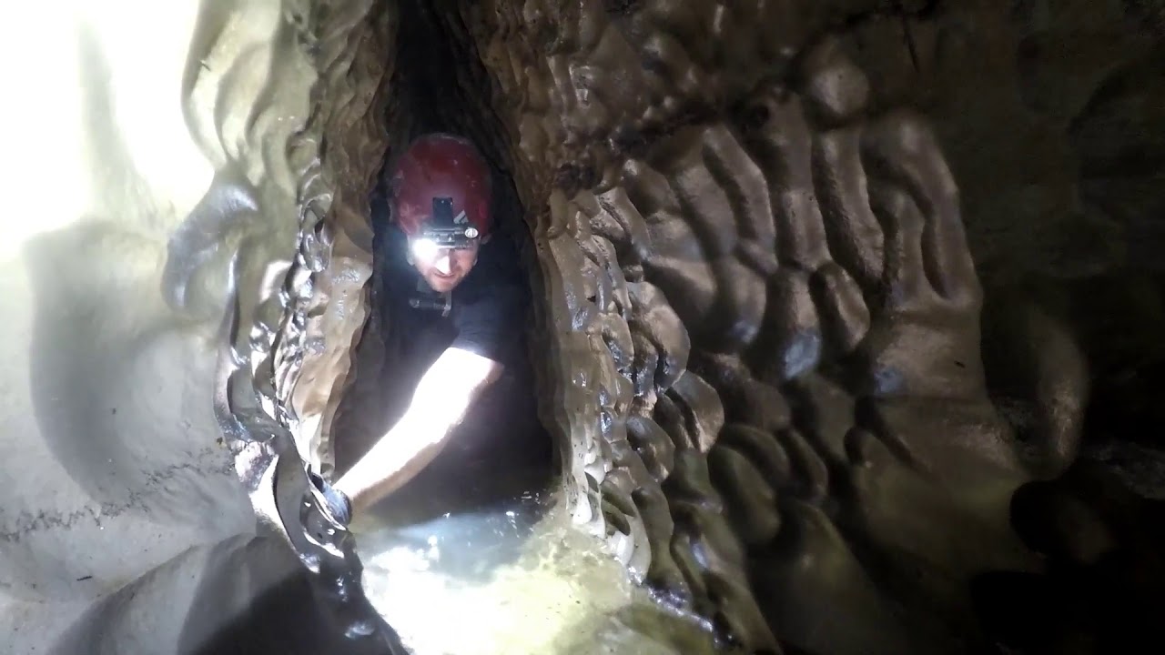 TIGHT SQUEEZE IN WET CAVE YouTube