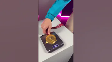 Weighind The Gold Medal وزن الميدالية الذهبية 