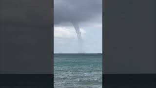 Waterspout Spotted off the Shore