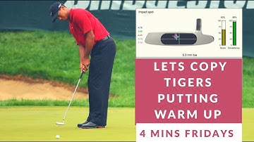 Tiger Woods putting pre round warm up.