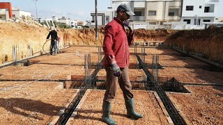 The first stages of construction before laying the concrete أول مراحل وضع الخرسان الأساس