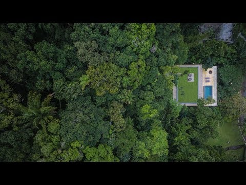 Video: Forførende blanding af natur, kunst og moderne arkitektur: Redcliffs House i New Zealand