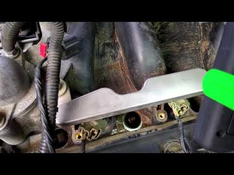 How to remove dirt from spark plug holes in any car