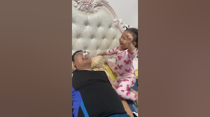 Dad made a mistake again. Dad takes care of the baby. Man takes care of the baby. Dad takes care