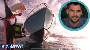 Caught on cam: Diver almost gets runover by boat