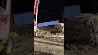 Winch cable breaks while cleaning up after a train derailment