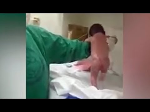 newborn baby walking after birth