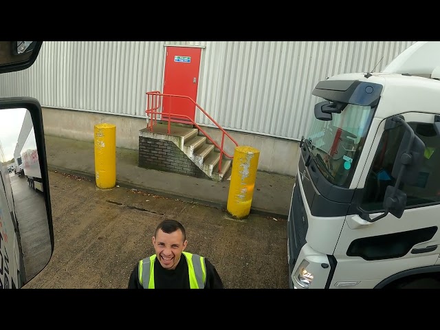 Truck driving reversing into a bay between two truck very tight C+E class=