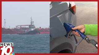 Where does the world’s oil travel through besides the Strait of Hormuz?