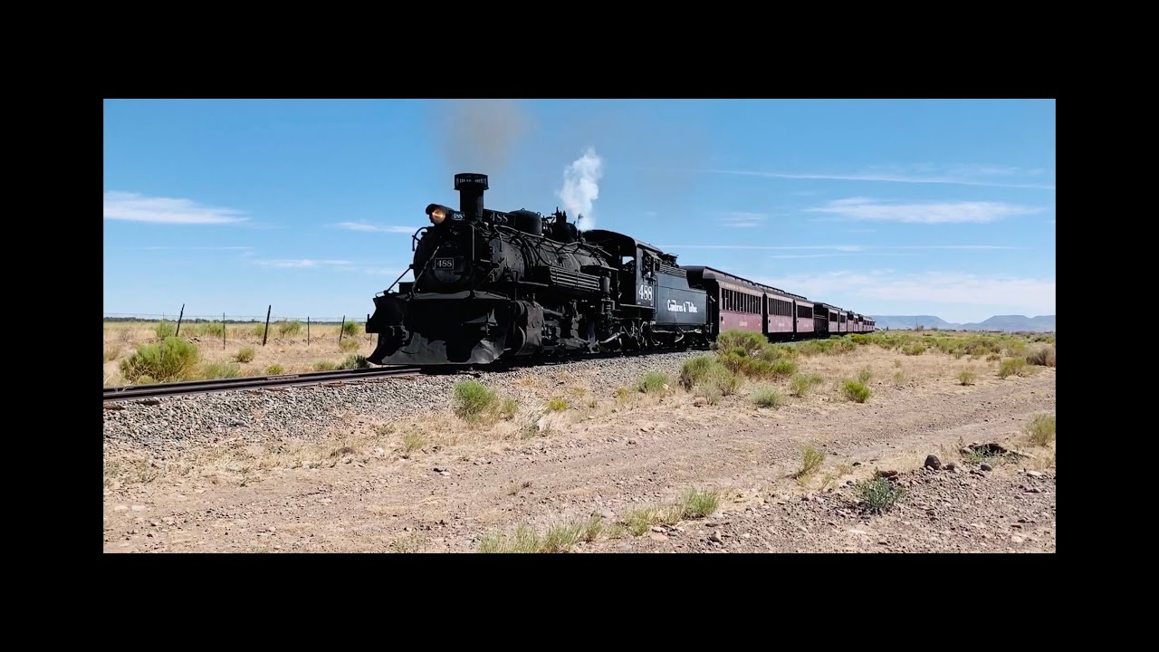 Cumbres and Toltec 488 leads a passenger train through the middle of ...