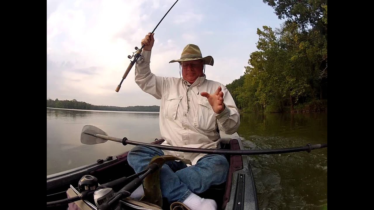 Largemouth Bass jumps into Kayak!!