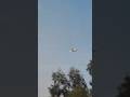 Boeing 737 landing above the highway