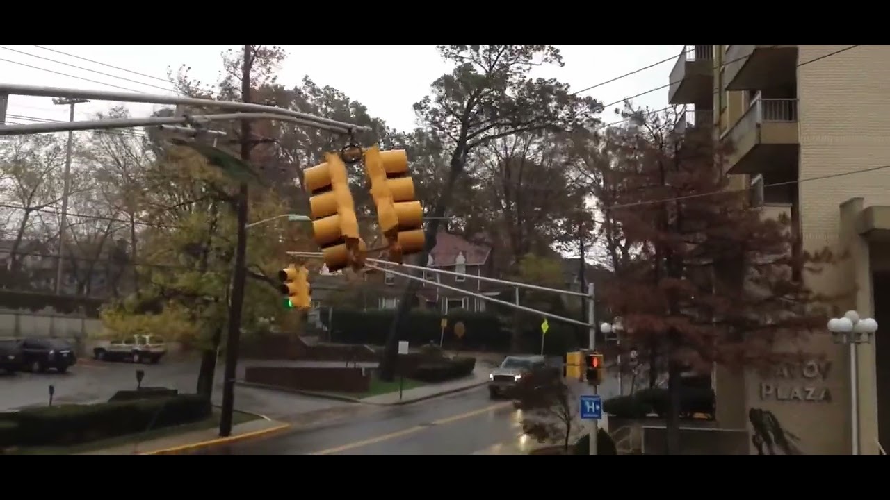 Tree Falls on Power Lines During Storm - YouTube