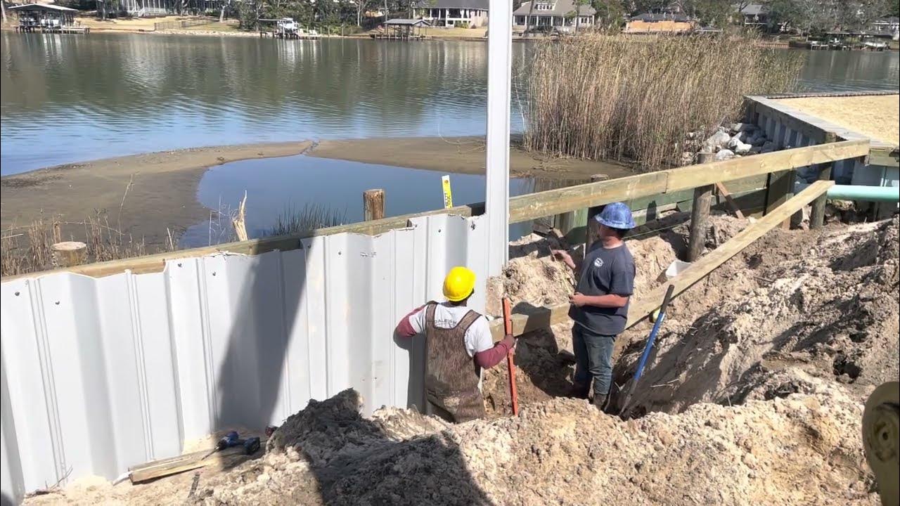 IS YOUR YARD SINKING? It’s amazing what a seawall and French drain