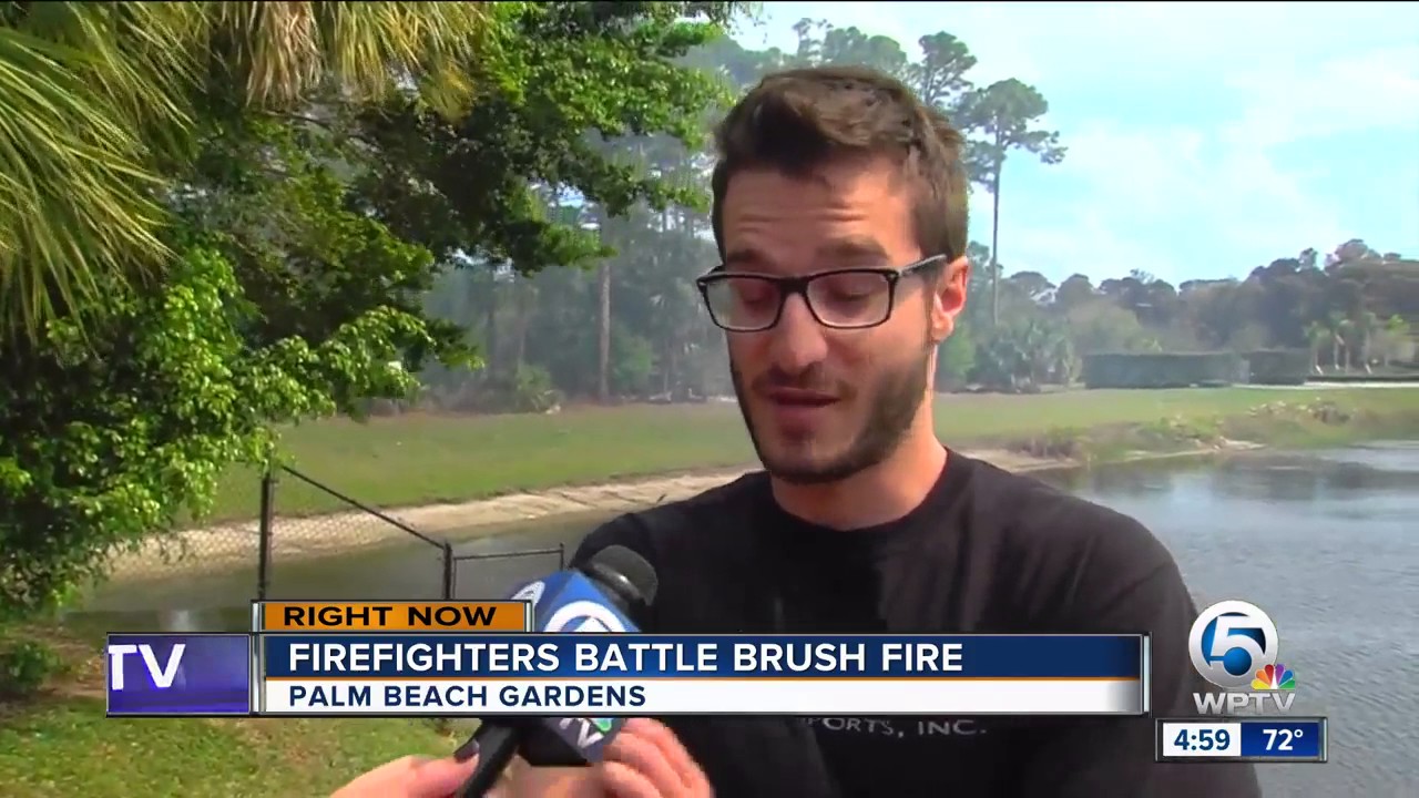 Firefighters battle brush fire - YouTube