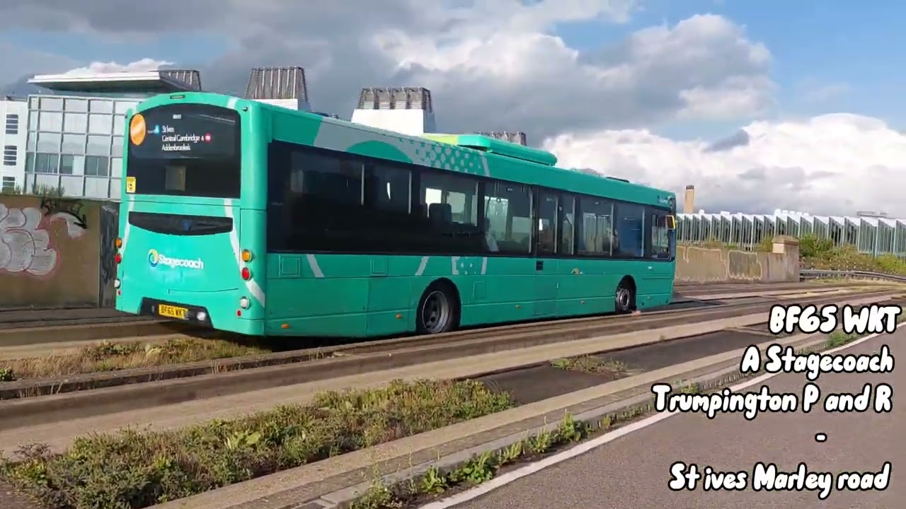 Buses and trains at Cambridge south Station 01/08/2025