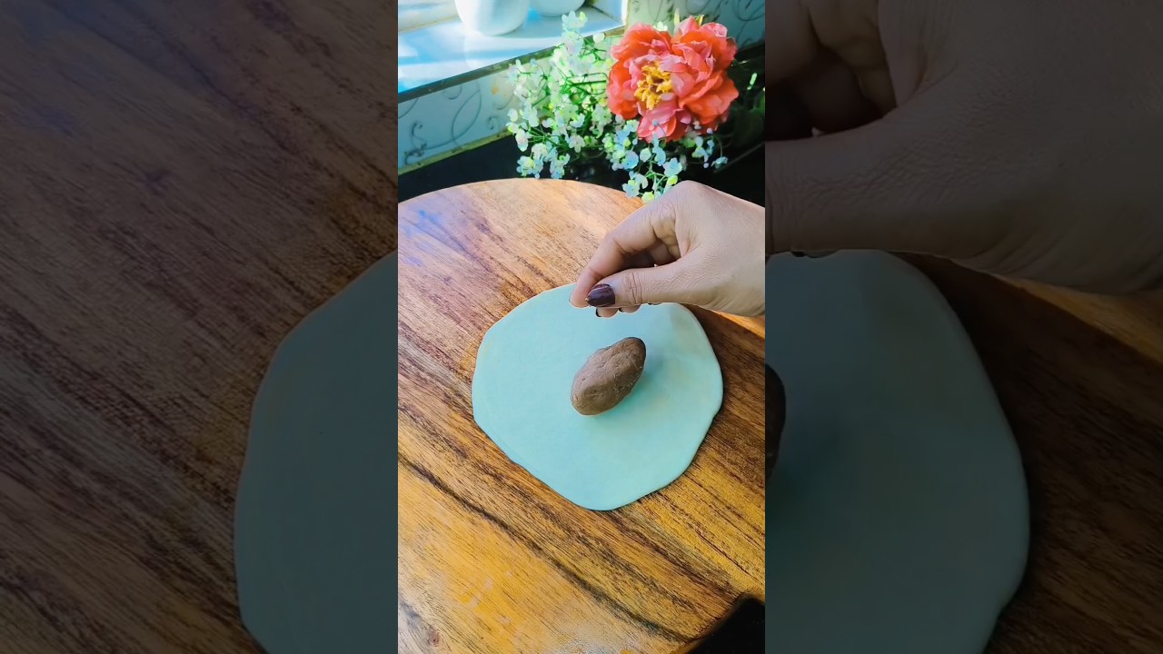 Chocolate stuffed pitha folding 🙂❤️ 