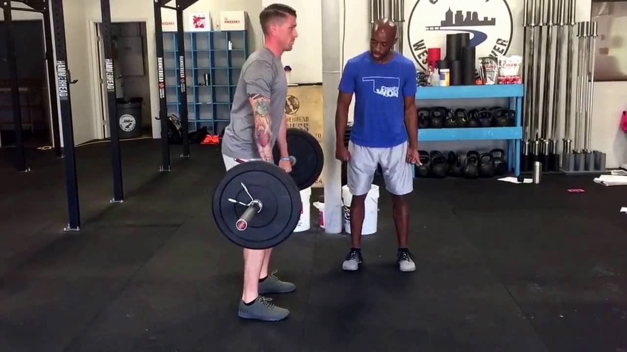Coach LaMonte and Coach Kelly demonstrate the deadlift