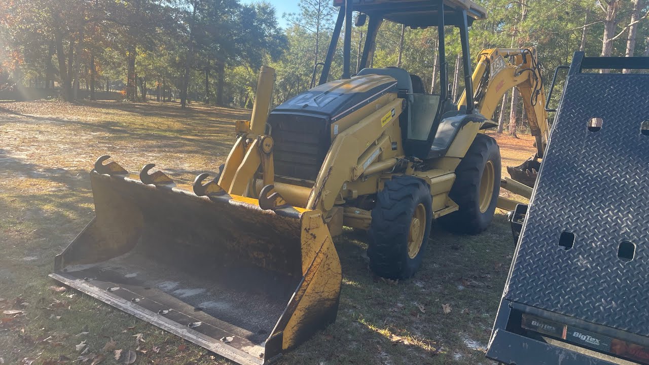 Проверка местоположения жидкости Cat 420d и как открыть капот