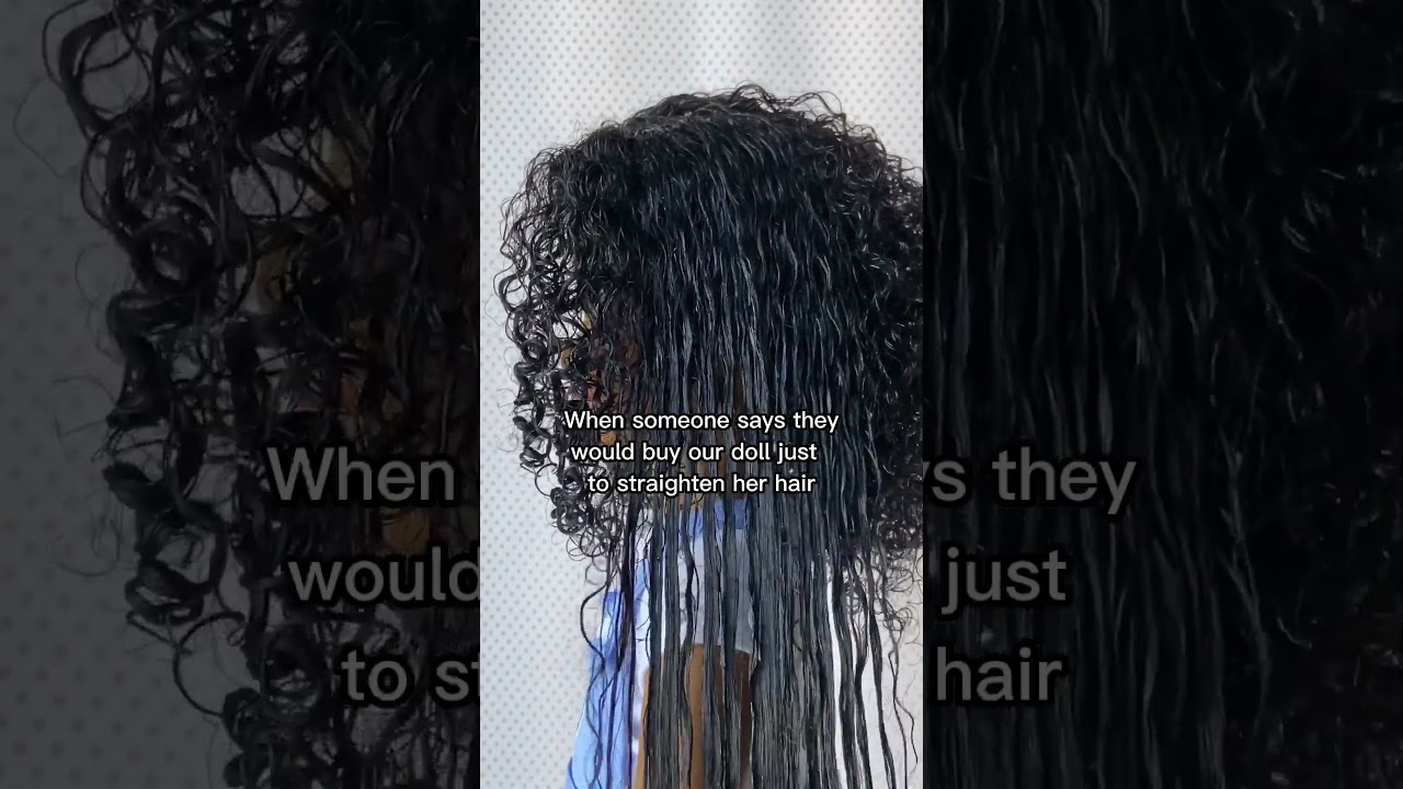 У этой куклы натуральные волосы, полные завитков! 