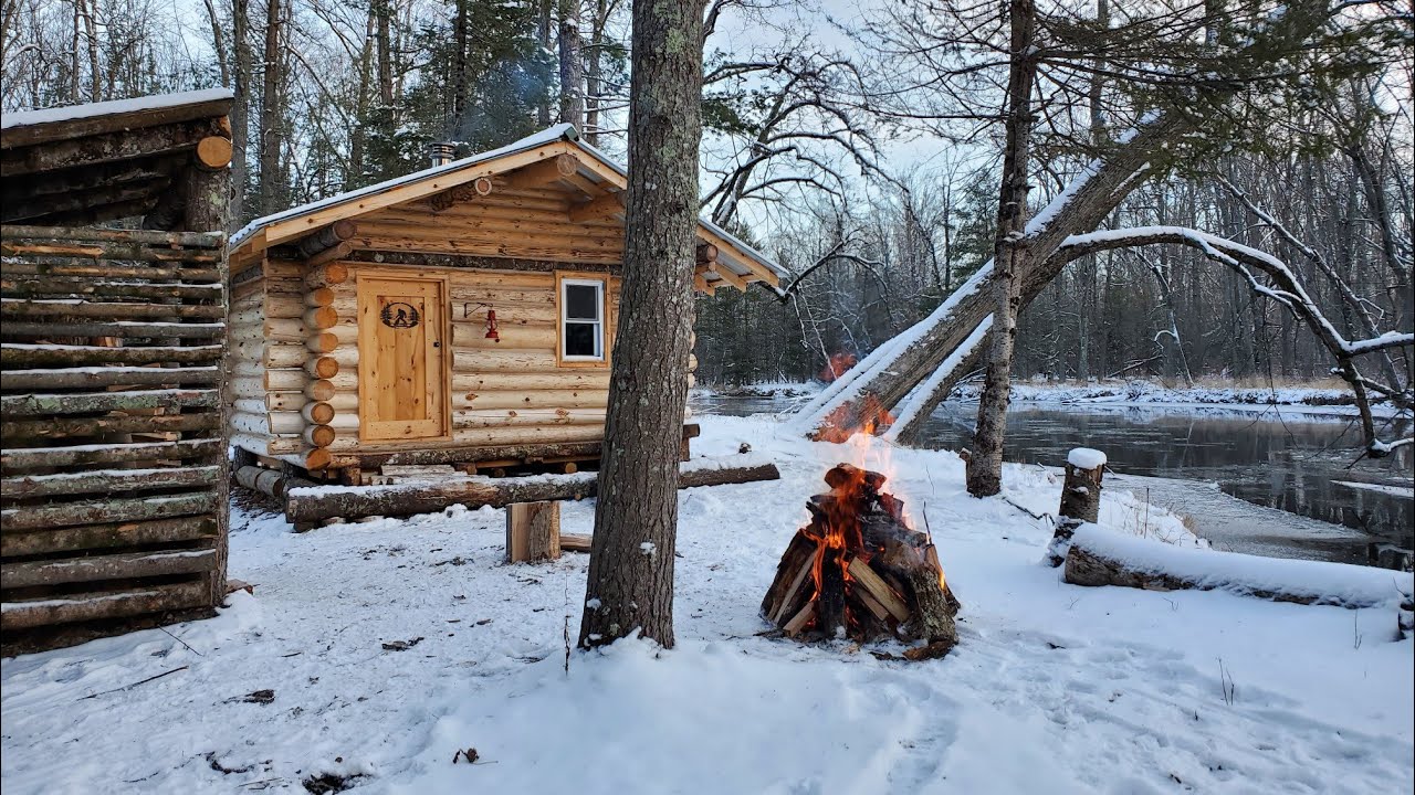 surviving Winter in a log cabin/ off grid building #OutdoorAdventures # ...