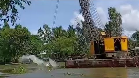 Xáng cạp đất. Xáng dây cảnh bơi trên sông nạo vét đất rất hiệu quả 151 - Thủy Miền Tây