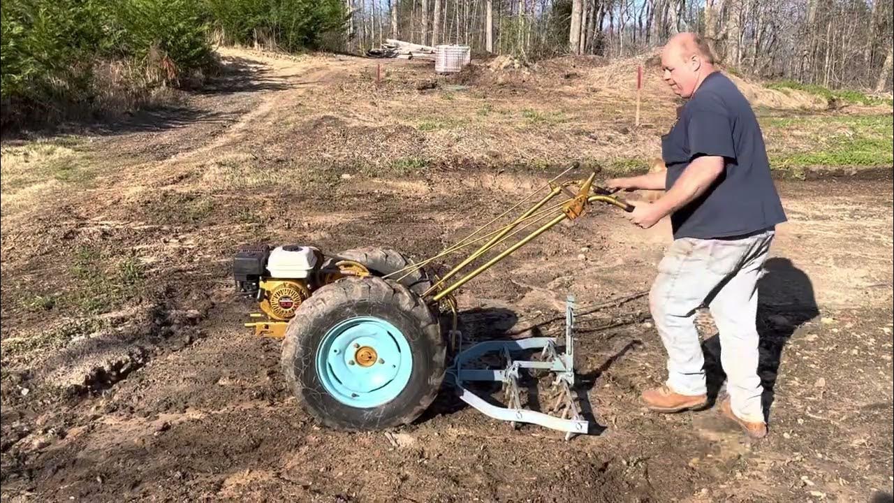Using a David Bradley walk behind tractor. YouTube