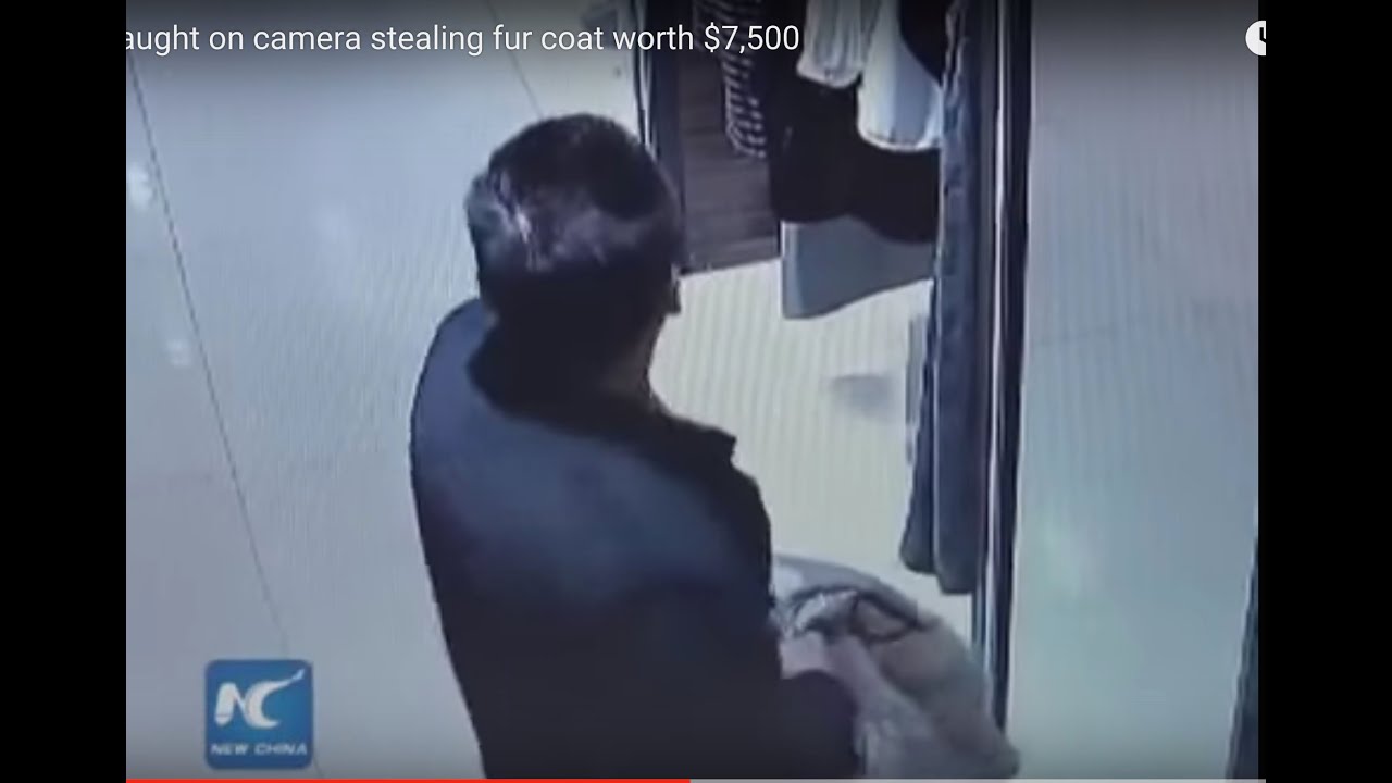 Man caught on camera stealing fur coat worth $7,500 - YouTube
