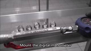 Vullings Water Supply System: Adjusting the pressure with a digital manometer