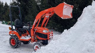 BX2370 Plowing Snow