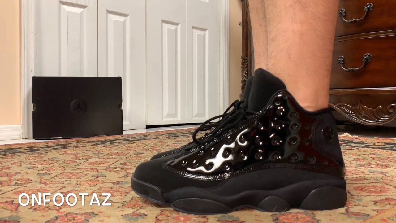 jordan 13 cap and gown on feet