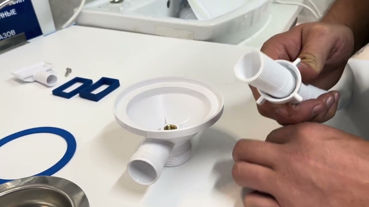 Установка выпуска с переливом А-4007-1 на кухонную металлическую мойку.