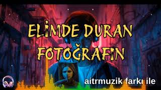 Elimde Duran Fotoğrafın - İstek Üzerine .... In Şarkıyıbensanayazdım